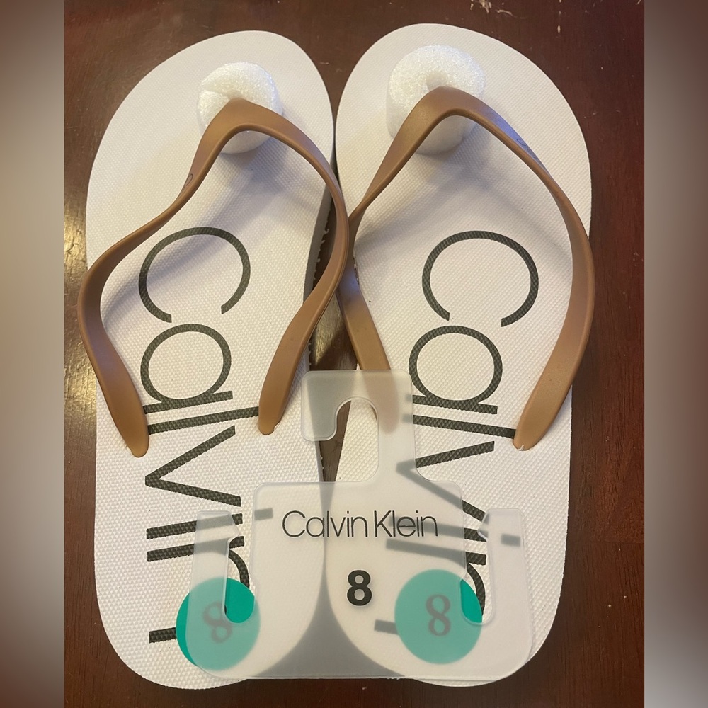 Flip flops by Calvin Klein called Salma in size 8.